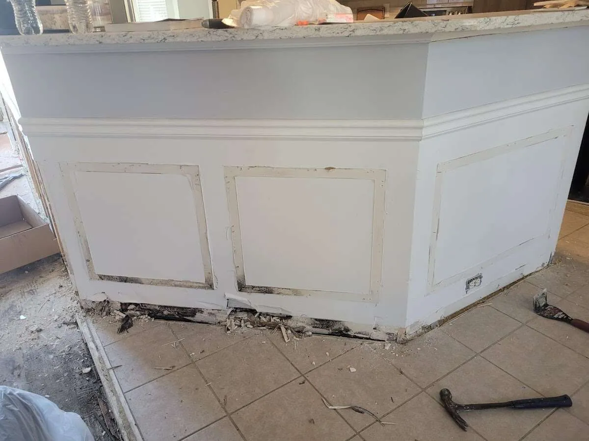 Water damage and mold on kitchen during Sewage Cleanup & Sanitation in Hermon